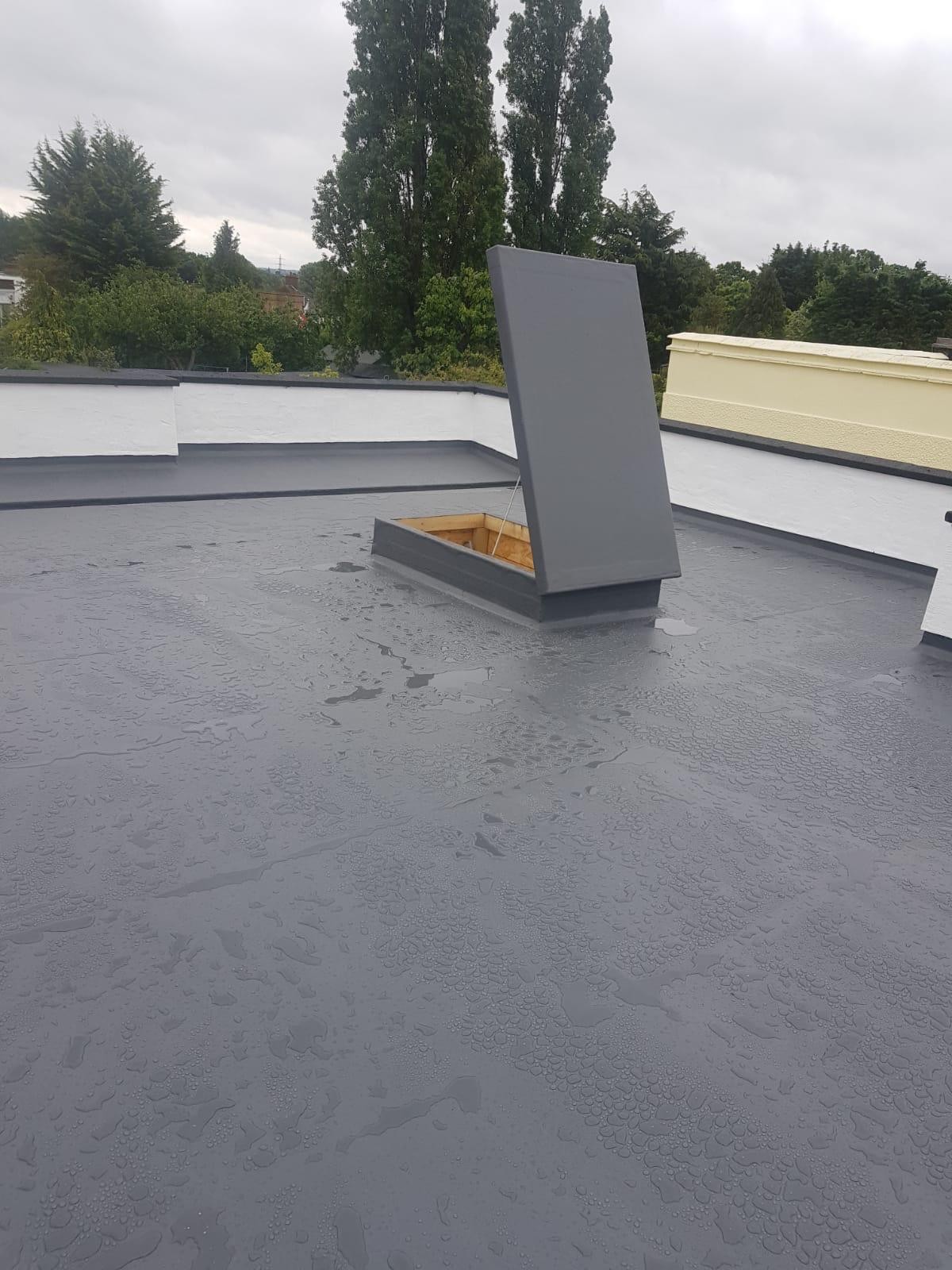 Flat roof replacement carried out on a home in Cobham